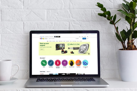 Kyiv, Ukraine - November 10, 2019: MacBook Internet shopping service eBay on the screen. MacBook was...
