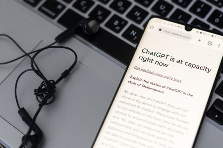 Kyiv, Ukraine - February 06, 2023 ChatGPT Chat artificial intelligence chatbot developed by Open AI is displayed on a Macbook screen with a Monitor.のeditorial素材