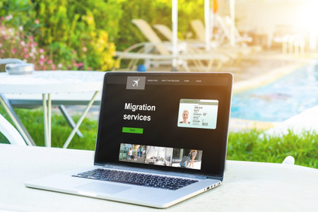 laptop with migration service, online for foreign job, education or emigration to America
