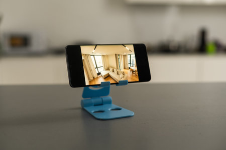 smartphone in a stand with designの写真素材