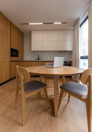 Interior of luxurious modern kitchen equipment, grey and oak cabinets