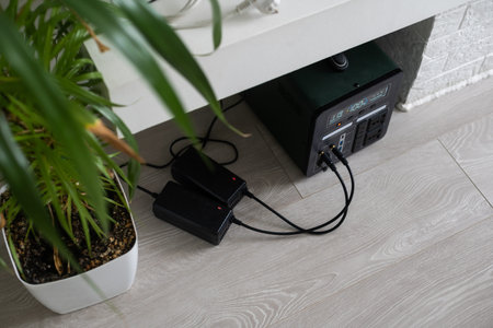 Portable Power Station is charging gadgets. Modern, information technology. Control panel. close up.