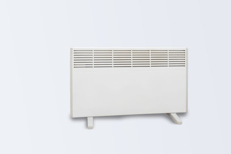 Oil electric heater on wheels isolated on white background.