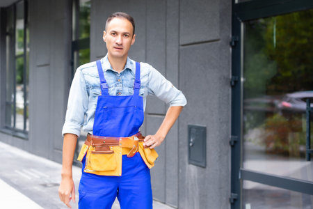 worker and professional builder with toolsの写真素材