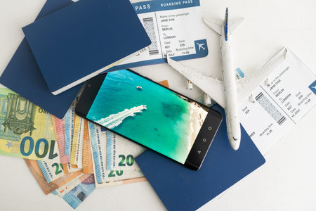 Airline tickets and documents on white background