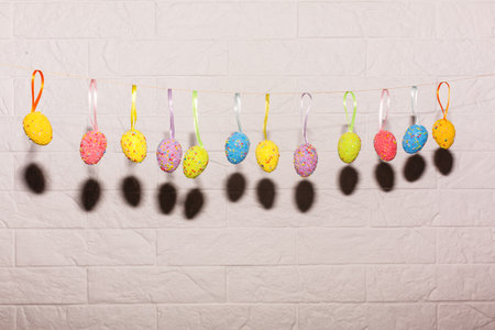 Colorful easter eggs background. Alot of painted Easter eggs as backgroundの写真素材