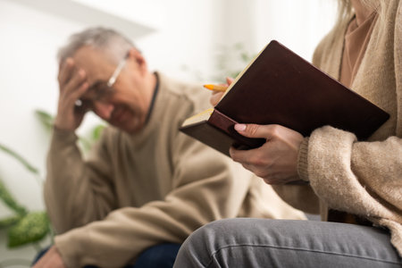 Image of young psychiatrist and her elder patient