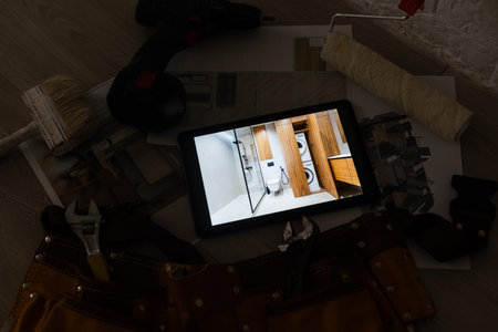 Computer Tablet Showing apartment Illustration Sitting On House Plans. tools