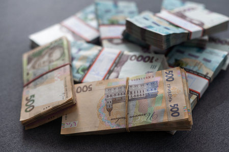 bundles of hryvnia. A stack with hryvnia. Much money. Close-up.