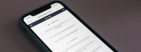 Screen with ChatGPT chat with AI or artificial intelligence. Man search for information using artificial intelligence chatbot developed by OpenAI. Kyiv, Ukraine - February 18, 2023のeditorial素材