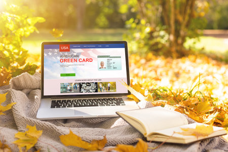 laptop with green cards Applicationの写真素材