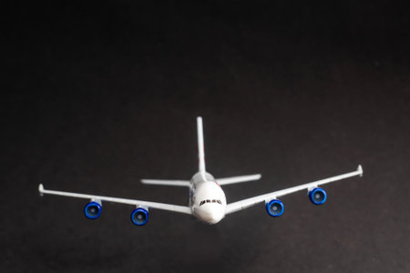 Airplane isolated on dark backgroundの写真素材