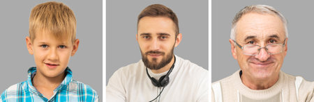 Studio photo shoot group portrait of cheerful big extended multi generational family against grey background.Happy smiling mom, dad, grandma, grandpa and two little kids all together looking at cameraの写真素材