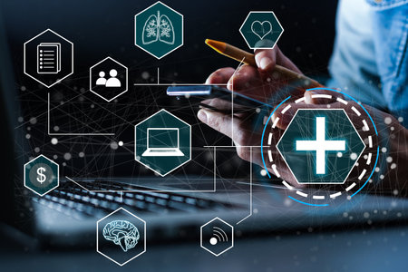 Businessman hold virtual medical network connection icons. Covid-19 pandemic develop people awareness and spread attention on their healthcare, rising growth in hospital and health insurance businessの写真素材