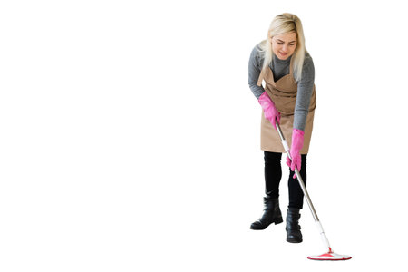 Young woman holding cleaning tools, isolated on whiteの写真素材