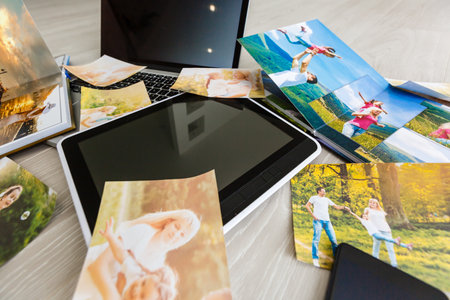 Hipster photography equipment with laptop and digital tablet on a vintage wooden desktop, flat layの写真素材