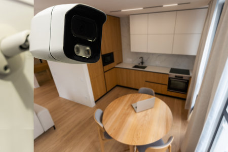 Modern CCTV camera installed in entryway of apartment buildingの写真素材