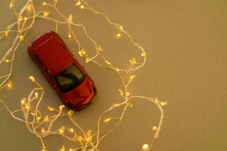 toy car with garland in the backgroundの写真素材