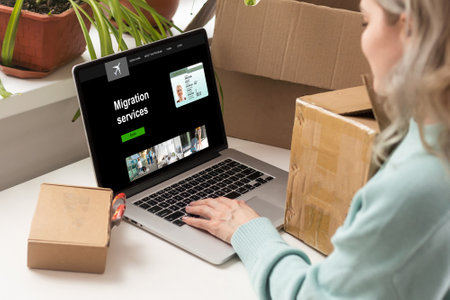laptop with migration service, online for foreign job, education or emigration to Americaの写真素材