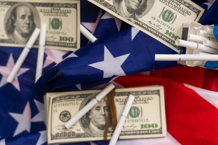 Transportation of illegal tobacco goods. Cigarettes on background of flag USAの写真素材