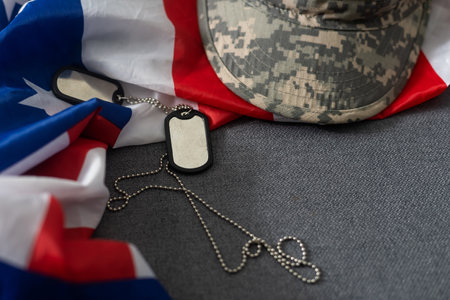 Soldiers token on American flag background.の写真素材