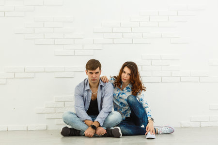 Loving couple sitting together. the couple is emotionalの写真素材