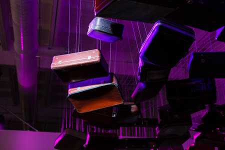 Pile of colorful vintage suitcases.の写真素材