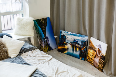 Canvas print in the room. Photo with gallery wrap method of canvas stretching on stretcher bar. Interior decorの写真素材