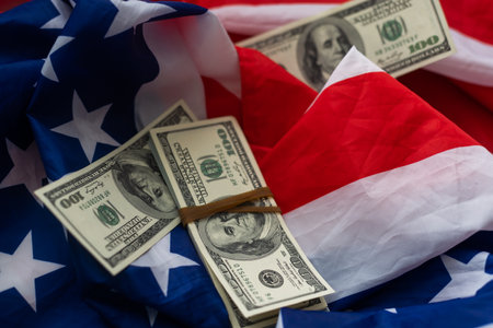 USA national flag and currency usd money banknotes. Business and finance conceptの写真素材