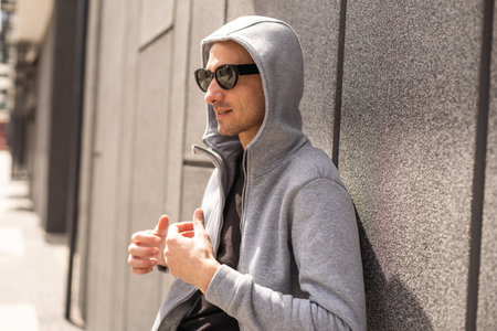 Successful caucasian middle-aged man in casual outfit with arms crossed isolated over gray backgroundの写真素材