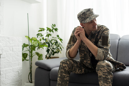 Portrait of middle aged sad, desperate military man during therapy session. Disabled soldier...