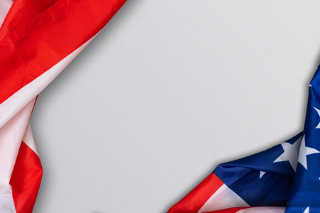 Closeup of American flag on plain backgroundの写真素材