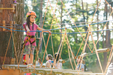 little girl getting ready for climbingの写真素材