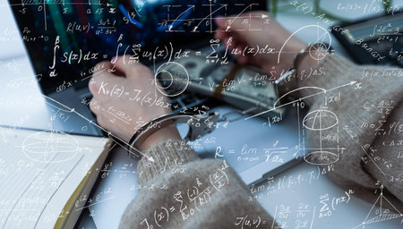 Quantitative analyst is drawing different math formulas on the glass screen.の写真素材