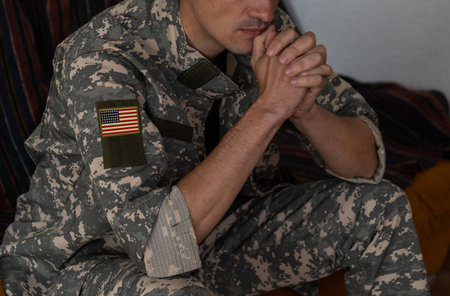 Soldier: Man In Uniform Praying.の写真素材