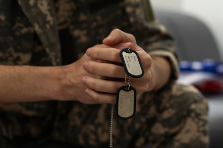 Portrait of middle aged sad, desperate military man during therapy session. Disabled soldier suffering from depression psychological trauma. PTSD concept.の写真素材