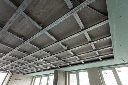 Working process of installing metal frames for plasterboard -drywallの写真素材
