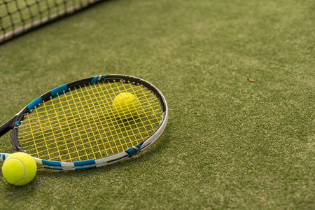 Tennis racket and balls, flat lay. Space for textの写真素材