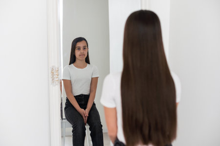 teenage girl with long hair haircutの写真素材