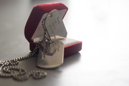 military token in a wedding ring boxの写真素材