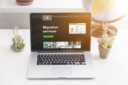 laptop with word migration serviceの写真素材