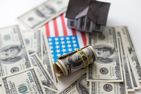 Small Model House on Layer of One Hundred Dollar Bills.の写真素材