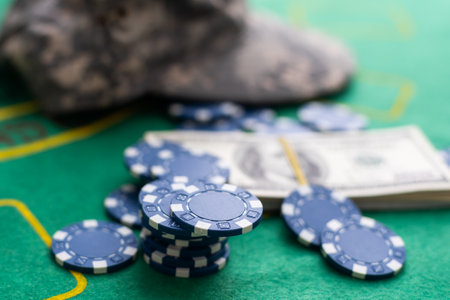 Poker playing chips with card and dollar banknoteson a casino green table. Online gambling. Texasの写真素材