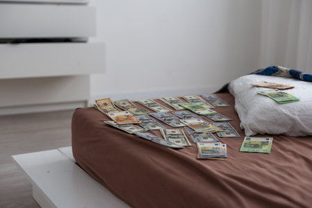 wallet with money out of a murder evidence bag, conceptual imageの写真素材