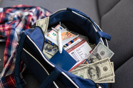 Inscription travel, Airplane, air ticket and money . Travel concept, copy space.の写真素材