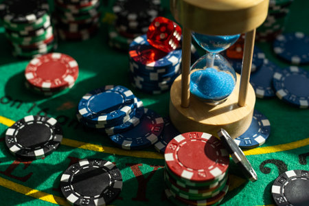 Poker Chips on a gaming table with dramatic lightingの写真素材