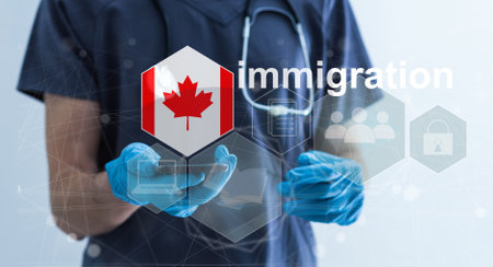 Concept of immigration to Canada with virtual button pressingの写真素材