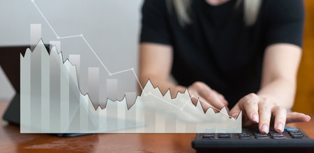 Business growth and financial investment concept. Businessman hand drawing virtual screen Graph analysis of business growth and investment, strategic planning to increase sales profits.の写真素材