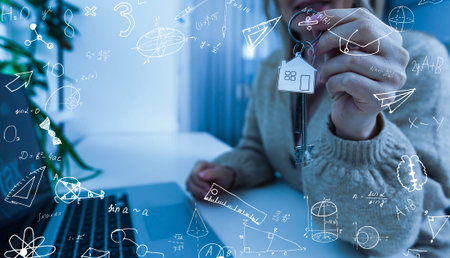 Quantitative analyst is drawing different math formulas on the glass screen.の写真素材