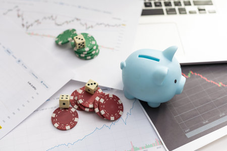 saving and investment for retirement plan, piggy bank and virtual trading graph in concept of invest now for lifeの写真素材